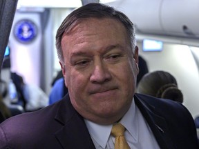 U.S. Secretary of State Mike Pompeo talks to reporters on his plane on his way to the Middle East, Monday, Jan. 7, 2019.