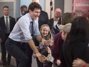 Prime Minister Justin Trudeau is greeted by a group of young fans as he attends Fundy Royal MP Alaina Lockhart‚Äôs nomination event in Quispamsis, N.B., on Wednesday, Jan. 23, 2019.