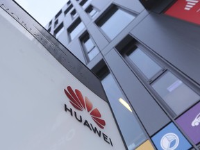The Huawei logo displayed at the main office of Chinese tech giant Huawei in Warsaw, Poland, on Friday, Jan. 11, 2019. Poland's Internal Security Agency has charged a Chinese manager at Huawei in Poland and one of its own former officers with espionage against Poland on behalf of China.
