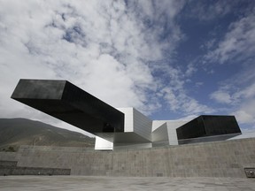 The Union of South American Nations, UNASUR, building stands forlorn near Quitom Ecuador, Wednesday, Dec. 19, 2018. What was once an aspiring diplomatic hub bustling with official translators and cocktail parties for visiting dignitaries looks more like a ghost building, with barely half the staff it had when it was inaugurated to great fanfare in 2014.