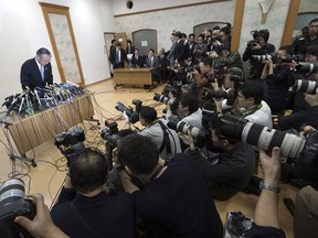 International Olympics Committee member and head of the Japanese Olympic Committee Tsunekazu Takeda arrives at the venue at the begging of a press conference in Tokyo Tuesday, Jan. 15, 2019. Takeda has denied corruption allegations against him concerning reported bribes paid to be awarded the rights to host the 2020 Olympics.