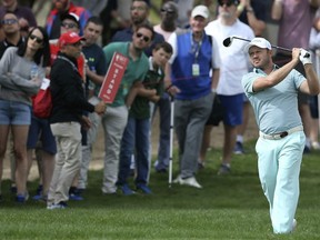 Richard Sterne of South Africa plays a shot on the 2nd hole in the final round of the Abu Dhabi Championship golf tournament in Abu Dhabi, United Arab Emirates, Saturday, Jan. 19, 2019.