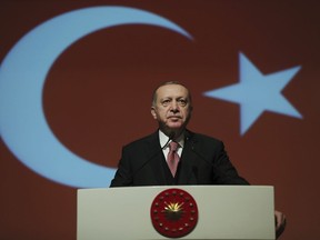 Turkey's President Recep Tayyip Erdogan delivers a speech during a military academy ceremony in Ankara, Turkey, Thursday Jan. 24, 2019. Erdogan says he is shocked by U.S. President Donald Trump's decision to recognise Venezuelan opposition leader Juan Guaido's claim to the presidency.(Presidential Press Service via AP, Pool)