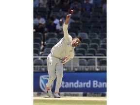 South Africa's bowler Duanne Olivier bowls on day two of the third cricket test match between South Africa and Pakistan at the Wanderers stadium in Johannesburg, South Africa, Saturday, Jan. 12, 2019.