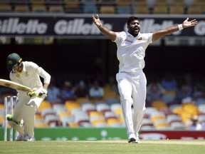 Sri Lanka's Lahiru Kumara appeals for the wicket of Australia's Marnus Labuschagne, left, during the cricket test match between Australia and Sri Lanka in Brisbane, Australia, Friday, Jan. 25, 2019.