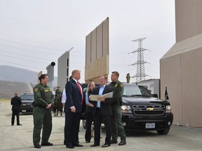 U.S. President Donald Trump inspects border wall prototypes in San Diego, California on March 13, 2018.