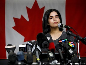 Rahaf Mohammed, 18, addresses the media during a press conference in Toronto at the offices of COSTI, a refugee resettling agency, on Jan. 15, 2019.