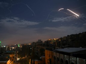 A picture taken early on January 21, 2019 shows Syrian air defence batteries responding to what the Syrian state media said were Israeli missiles targeting Damascus. - Israel struck what it said were Iranian targets in Syria today in response to rocket fire it blamed on Iran, sparking concerns of an escalation after a monitor reported 11 fighters killed. Israel openly claimed responsibility for the strikes against facilities it said belonged to the Iranian Revolutionary Guards' Quds Force, continuing its recent practice of speaking more openly about such raids.