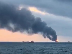 An image grab taken from AFP TV on January 21, 2019 shows a burning ship after a fire engulfed at two gas tankers in the Black Sea off Crimea.