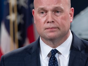 Acting US Attorney General Matthew Whitaker announces a 13-count indictment of financial fraud charges against Chinese telecommunications manufacturer Huawei, as well as two affiliated companies and Huawei's Chief Financial Officer Wanzhou Meng, during a press conference at the Department of Justice in Washington, DC, January 28, 2019.