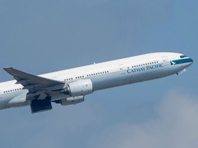 In this picture taken on October 22, 2018, a Cathay Pacific passenger jet takes off from Hong Kong International Airport.