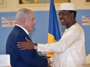 Chadian President Idriss Deby Itno (R) and Israeli Prime Minister Benjamin Netanyahu give a joint press conference during their meeting at the presidential palace in N'Djamena on January 20, 2019. - Israel and Chad have renewed diplomatic ties decades after they were ruptured, Israel's prime minister announced on January 20 during a visit to the African state.