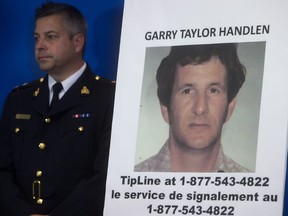 A photo of Garry Taylor Handlen is displayed during a news conference in Surrey, B.C., on Monday December 1, 2014.