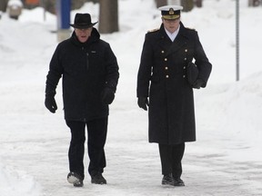 Vice-Admiral Mark Norman (right) arrives at the courthouse in Ottawa, Tuesday, January 29, 2019.