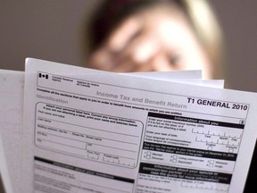 A tax return form is pictured in Toronto on Wednesday April 13, 2011. Federal officials are set to blitz seniors in the coming weeks with letters to remind them to file their taxes on time in a bid to get benefits to more low-income seniors.THE CANADIAN PRESS/Chris Young