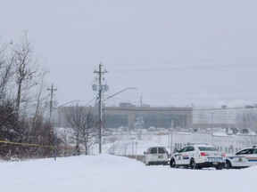 RCMP officers investigate following an incident in Dieppe, N.B., in this Saturday, Jan. 5, 2019 handout photo. Police say a member of the RCMP fired their gun at a suspect who they allege "took actions threatening first responders" during an incident in Dieppe, N.B., on Saturday. Sgt. Nick Arbour declined to say if the 25-year-old Nova Scotian woman was shot, but confirmed that she was sent to hospital with non-life-threatening injuries.