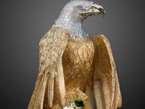 A golden eagle sculpture is shown in a handout photo from Delta Police. A major insurance company is fighting back after a British Columbia court required it to make good on a policy covering a gold, diamond-encrusted eagle statue allegedly stolen in Metro Vancouver more than two years ago.