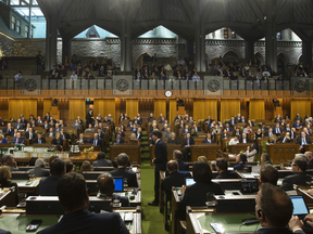 Prime Minister Justin Trudeau, centre, rises during Question Period in the House of Commons, Jan. 28, 2019.