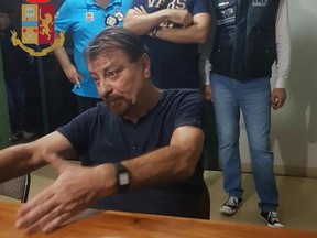 A handout picture handout by the Italian State Police (Polizia di Stato) released on January 13, 2019 shows former far-left Italian militant Cesare Battisti after he was arrested late on January 12, 2019 in the Bolivian city of Santa Cruz de la Sierra.