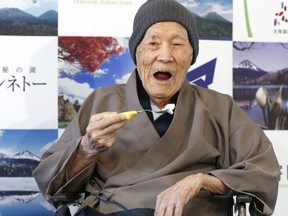 n this April 10, 2018, file photo, Masazo Nonaka eats a cake after receiving the certificate from Guinness World Records as the world's oldest living man at then age 112 years and 259 days during a ceremony in Ashoro on Japan's northern main island of Hokkaido. In the early hours of Sunday, Jan. 20, 2019.