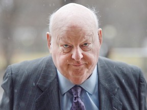 Suspended Senator Mike Duffy arrives at the courthouse for his trial in Ottawa Monday, April 20, 2015.