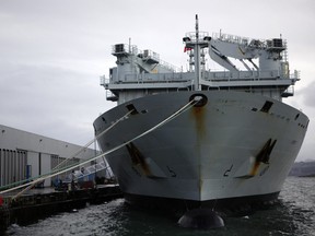 The MV Asterix, a commercial container ship converted into a supply ship for the Royal Canadian Navy sits docked at Ogden Point.