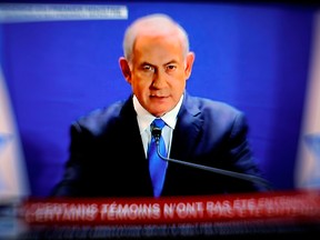 Israeli Prime Minister Benjamin Netanyahu delivers a statement live on I24 TV on Jan. 7, 2019.