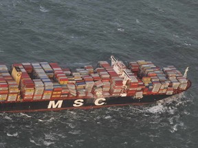 Aerial photo shows container vessel MSC ZOE near the German North Sea island of Borkum Wednesday, Jan. 2, 2019.