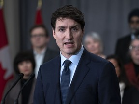Prime Minister Justin Trudeau responds to questions during a news conference following a cabinet retreat in Sherbrooke, Que. on Friday, January 18, 2019.