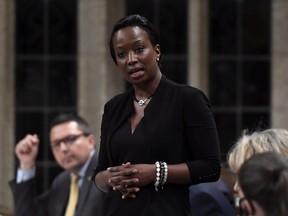 Celina Caesar-Chavannes rises during Question Period in the House of Commons on Parliament Hill in Ottawa on Friday, May 25, 2018.