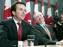 Progressive Conservative MP Scott Brison with Liberal Leader Paul Martin at a press conference shortly after Brison announced he would be switching parties, Dec. 10, 2003.