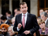 Scott Brison speaks during question period in the House of Commons on Oct. 16, 2018.