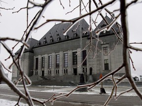 Ice coats tree branches outside of the Supreme Court of Canada in Ottawa in a file photo from Dec.10, 2012.