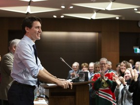 Prime Minister Justin Trudeau addresses a meeting with caucus on Parliament Hill in Ottawa on Sunday, January 20, 2019.