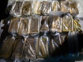 Gold bars wrapped in plastic are seen before being transported to the Central Bank of Venezuela in Caracas, Venezuela, on Thursday, March 22, 2018.