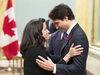THEN: Prime Minister Justin Trudeau embraces Minister of Justice Jody Wilson-Raybould during a swearing-in ceremony on Nov. 4, 2015.
