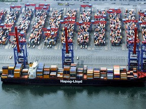 The container ship Yantian Express is shown in a handout photo from Hapag-Lloyd. Crews working to extinguish a fire that's been burning for four days aboard a large container ship off Canada's east coast are facing some big challenges, an expert in offshore safety says.