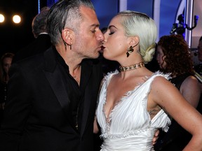 Christian Carino and Lady Gaga attend the 25th Annual Screen Actors Guild Awards at The Shrine Auditorium on January 27, 2019 in Los Angeles, California.