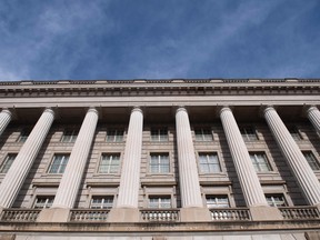 The U.S. Internal Revenue Service building is seen on the first work day for furloughed federal workers following a 35-day partial government shutdown in Washington. The five-week government shutdown subtracted US$11 billion from the U.S. economy, about twice the amount President Donald Trump sought to fund a border wall, an independent congressional body said.