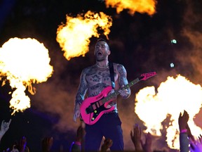 Lead vocalist of Maroon 5 Adam Levine performs during the halftime show of Super Bowl LIII between the New England Patriots and the Los Angeles Rams at Mercedes-Benz Stadium in Atlanta, Georgia, on February 3, 2019.