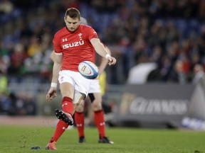 Wales' Dan Biggar kicks the ball during the Six Nations rugby union international between Italy and Wales, at Rome's Olympic Stadium, Saturday, Feb. 9, 2019.