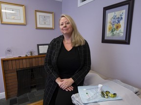 Colleen McQuarrie, naturopathic doctor and chair of the board of governors of the Canadian College of Naturopathic Medicine, poses in her office in Ottawa, Tuesday, February 5, 2019. Naturopathic clinics in Ontario offering Pap smears say their pampered approach to the medical procedure helps put patients at ease.