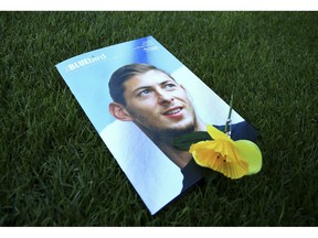A view of the match day programme with an image of Emiliano Sala on the cover, ahead of the English Premier League soccer match between Cardiff and Bournemouth at the Cardiff City Stadium, in Cardiff, Wales, Saturday, Feb. 2, 2019.