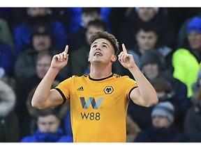 Wolverhampton Wanderers' Leander Dendoncker celebrates scoring his side's third goal during the  English Premier League soccer match between Everton and Wolverhampton Wanderers at Goodison Park, in Liverpool, England, Saturday, Feb. 2, 2019.
