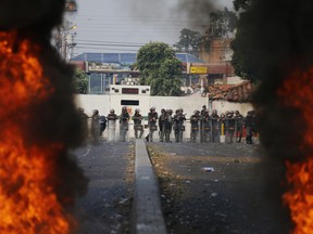 Bolivarian National Guard troops man a barricade blocking access to the Francisco De Paula Santander international bridge in Urena, Venezuela, on the border with Colombia.