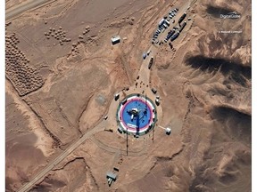 This Feb. 5, 2019, satellite image provided by DigitalGlobe shows a missile on a launch pad and activity at the Imam Khomeini Space Center in Iran's Semnan province. Iran appears to have attempted a second satellite launch despite U.S. criticism that its space program helps it develop ballistic missiles, satellite images released Thursday, Feb. 7, 2019 suggest. Iran has not acknowledged conducting such a launch. (DigitalGlobe, a Maxar company via AP)