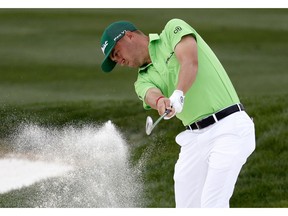 Justin Thomas hits from the sixth fairway bunker during the third round of the Phoenix Open PGA golf tournament, Saturday, Feb. 2, 2019, in Scottsdale, Ariz.