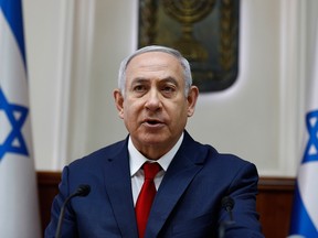 Israeli Prime Minister Benjamin Netanyahu chairs the weekly cabinet meeting at his Jerusalem office on Feb. 10, 2019.