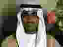 In this image from video released by the CIA, Hamza bin Laden is seen as an adult at his wedding. The never-before-seen video of Osama bin Laden's son and potential successor was released Nov. 1, 2017, by the CIA in a trove of material recovered during the May 2011 raid that killed the al-Qaida leader at his compound in Pakistan. The one hourlong video shows Hamza bin Laden, sporting a trimmed mustache but no beard, at his wedding. He is sitting on a carpet with other men.