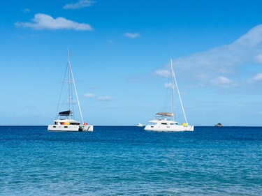 The 52-foot Lagoon and the 60-foot Fountaine Pajot bask in the sun.
